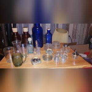 26 vintage glass pieces. Bottles, percolator tops, magnifying square, shot glass
